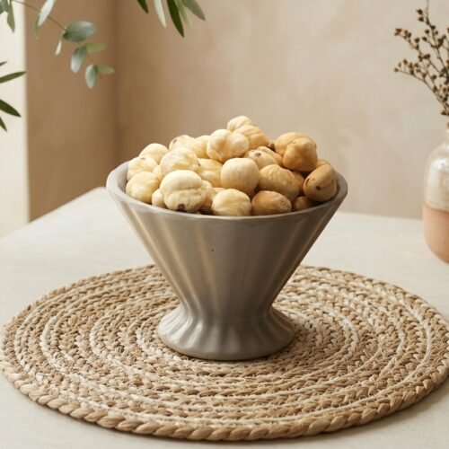 Premium whole raw pecan nut kernels by Oasis Dry Fruits, featuring a deep brown color and rich buttery texture.