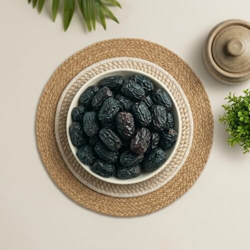 Top-down view of original Kalmi Premium dates on a rustic jute mat, perfect for daily nutrition and energy, available online at Oasis Dry Fruits.