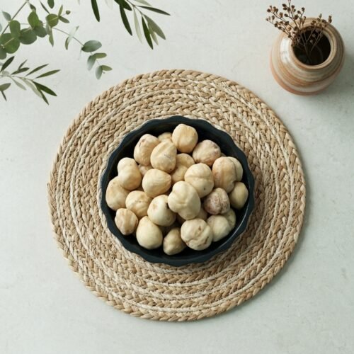 Top-down close-up of original raw pecan kernels, available in 250g and 500g packs at Oasis Dry Fruits Bangalore.