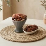 Premium whole raw pecan nut kernels by Oasis Dry Fruits, featuring a deep brown color and rich buttery texture.