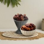 Premium Algerian Deglet Nour dates by Oasis Dry Fruits, famous for their translucent golden color and honey-like flavor.