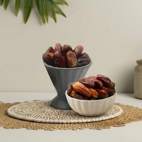 Premium Algerian Deglet Nour dates by Oasis Dry Fruits, famous for their translucent golden color and honey-like flavor.
