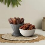 Premium Mashrook dates by Oasis Dry Fruits, featuring a distinct reddish-brown skin and natural firm texture.