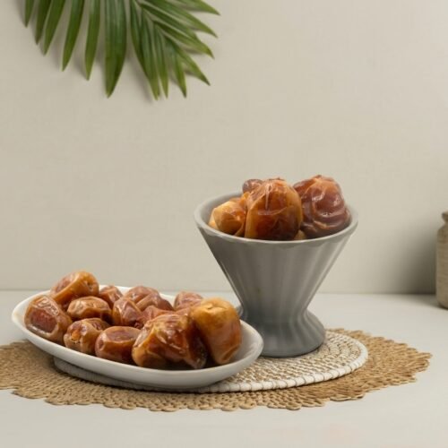 Premium golden Sukkari dates by Oasis Dry Fruits, known as the Queen of Dates for their soft texture and natural sweetness.