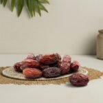 Premium medium-sized Medjool dates by Oasis Dry Fruits, showcasing their signature soft texture and natural caramel flavor.