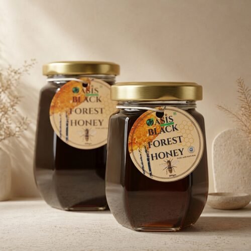 Premium 500g glass jar of Black Forest Honey by Oasis Dry Fruits, showcasing its iconic dark color and thick, syrupy texture.