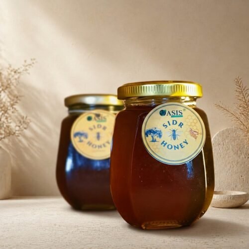 Premium 500g jar of SIDR Honey (Beri Honey) by Oasis Dry Fruits, showing its rich amber color and thick, unprocessed consistency.