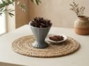 Natural whole Badiyan star anise pods served in a grey pedestal cup by Oasis Dry Fruits.