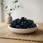 Premium blue berry dried served in a white ceramic bowl by Oasis Dry Fruits.