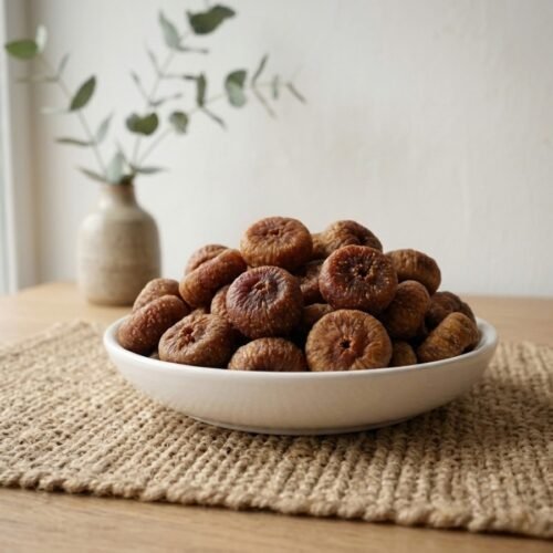 Premium dried figs baby small served in a white ceramic bowl by Oasis Dry Fruits.