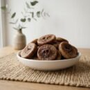 Premium dried figs king size served in a white ceramic bowl by Oasis Dry Fruits.
