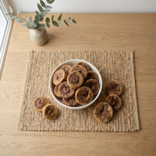 Top view flat lay of organic dried figs large in a bowl by Oasis Dry Fruits.