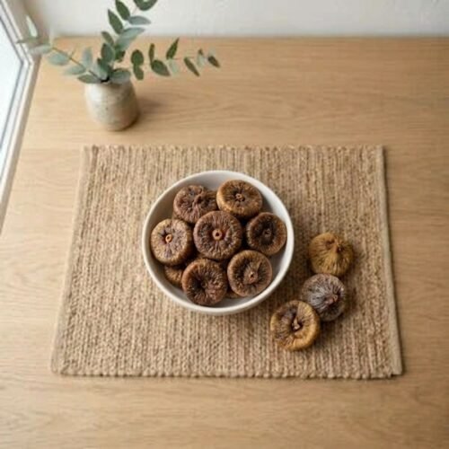 Top view flat lay of dried figs premium baby small in a bowl by Oasis Dry Fruits.