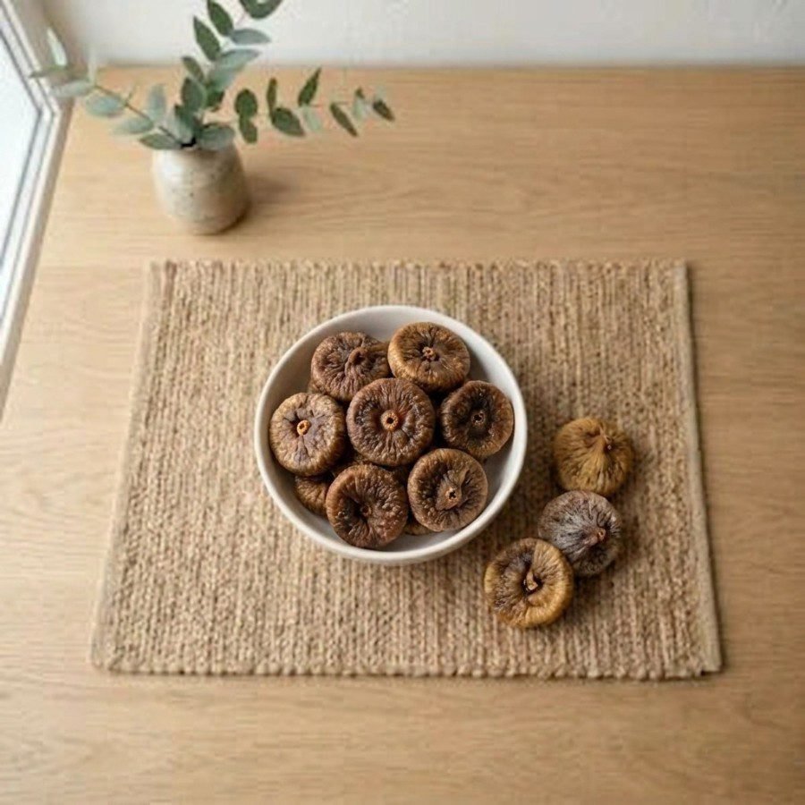 Top view flat lay of dried figs premium baby small in a bowl by Oasis Dry Fruits.