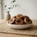 Dried figs premium baby small served in a white ceramic bowl by Oasis Dry Fruits.