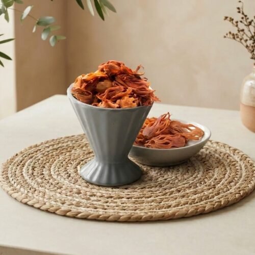 Whole aromatic Jathipathri Javitri mace served in a grey pedestal cup by Oasis Dry Fruits.