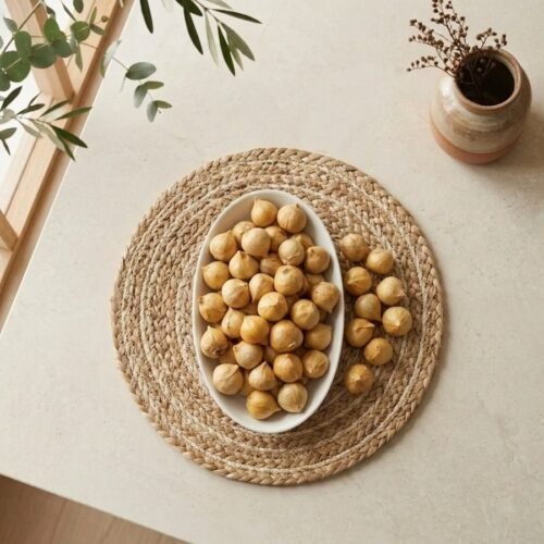 Top view flat lay of single clove Kashmiri Mountain Garlic in a dish by Oasis Dry Fruits.