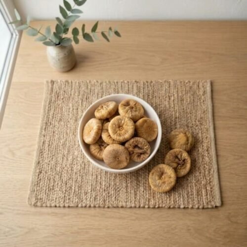 Top view flat lay of organic Ladakh Figs (Kashmir) in a bowl by Oasis Dry Fruits.