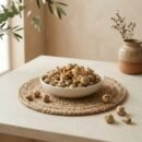 Side angle lifestyle view of dry paneer phool in a bowl by Oasis Dry Fruits.