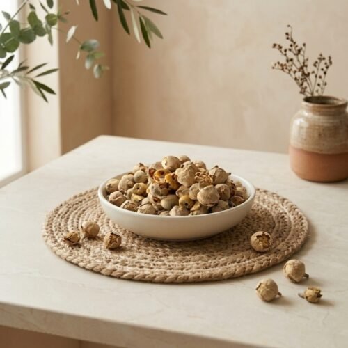 Side angle lifestyle view of dry paneer phool in a bowl by Oasis Dry Fruits.