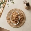 Top view flat lay of raw Premium Kashmiri walnut without shell kernels by Oasis Dry Fruits.