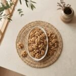 Top view flat lay of raw Premium Kashmiri walnut without shell kernels by Oasis Dry Fruits.