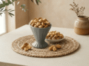Natural Kashmiri Mountain Garlic bulbs served in a pedestal ceramic cup by Oasis Dry Fruits.