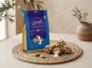 Cocoa Melts Roasted Almond 100g pouch with almond-crusted chocolate wafer rolls