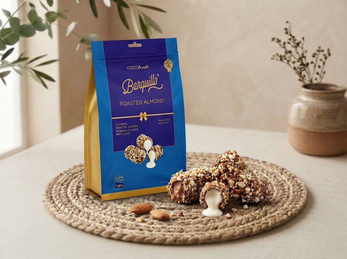 Cocoa Melts Roasted Almond 100g pouch with almond-crusted chocolate wafer rolls