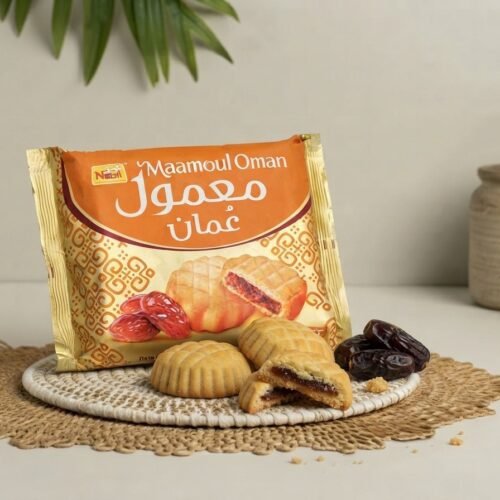 Maamoul Oman Date Filled Cookies pack with cookies and fresh dates on a jute mat